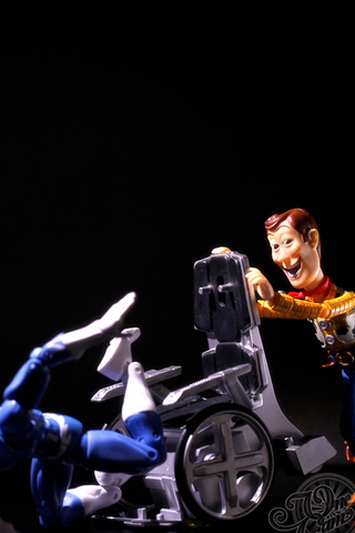 Illustration for article titled Creepy Woody Trolling the World's Coolest Figures and Toys